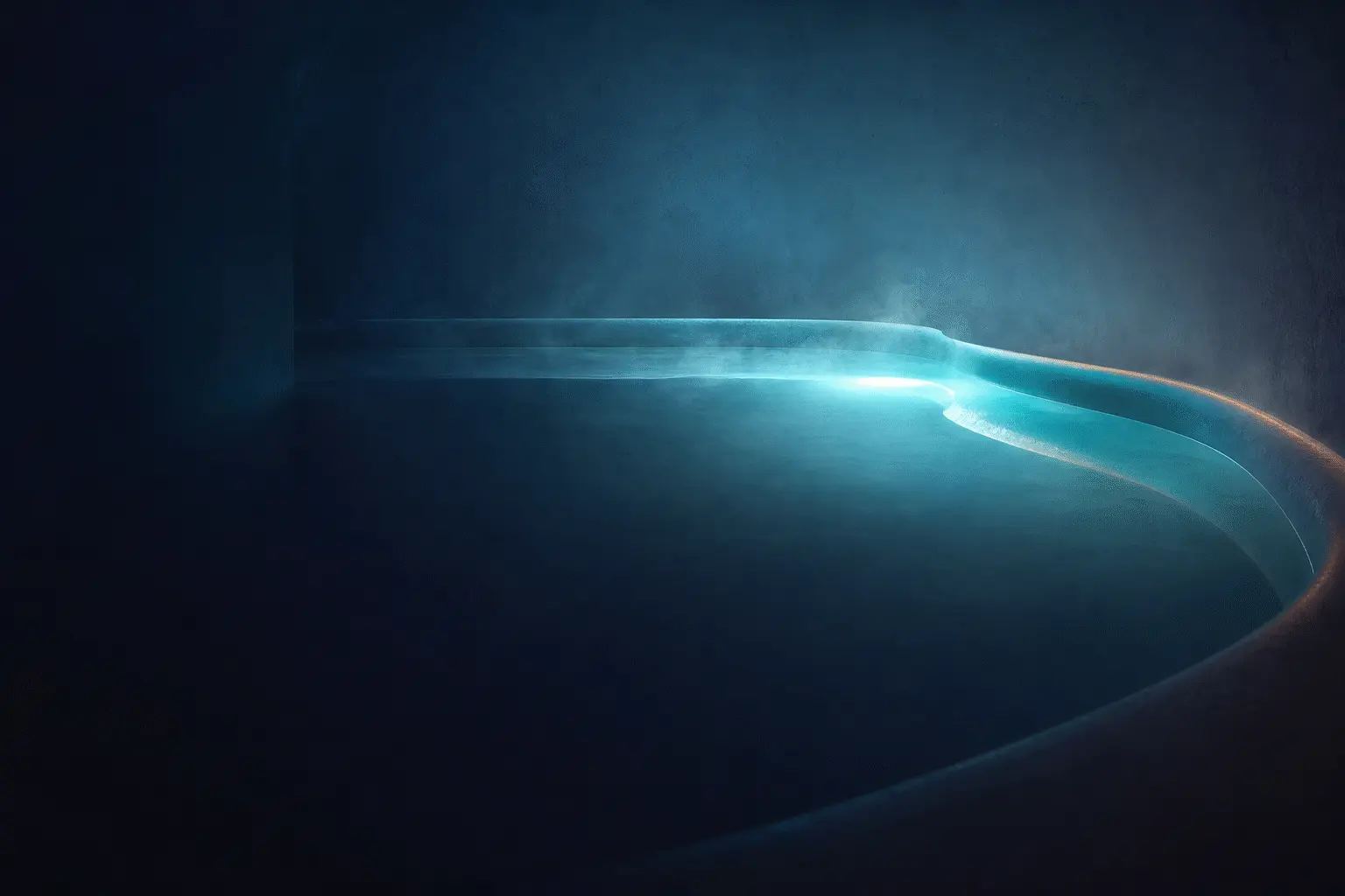 Glowing turquoise water curving through a dark float therapy pool